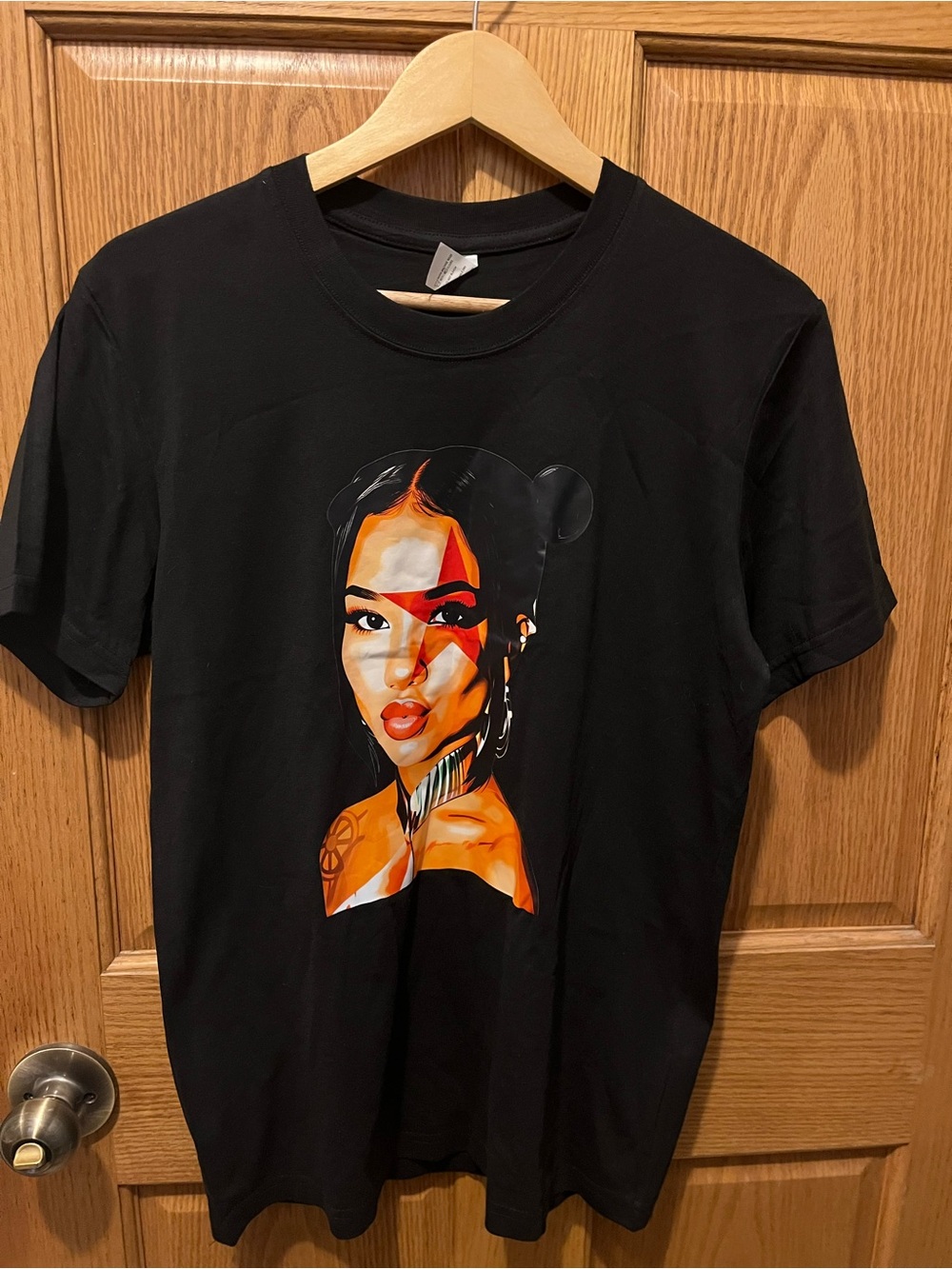 Women's Black Short Sleeve Tee with Orange Portrait Graphic